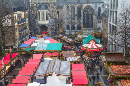 Cityscape - view of the Christmas Market on background the Aachen Cathedral, North Rhine-Westphalia, Germany