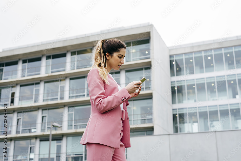 Stylish model with coffee and smartphone Stylish model with coffee and smartphone