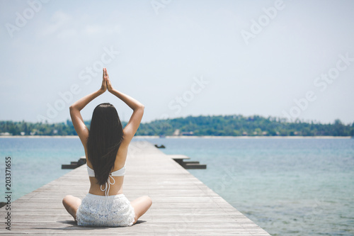 Woman yoga on bridge