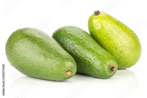 Three green smooth avocado isolated on white background ripe bacon variety. photo