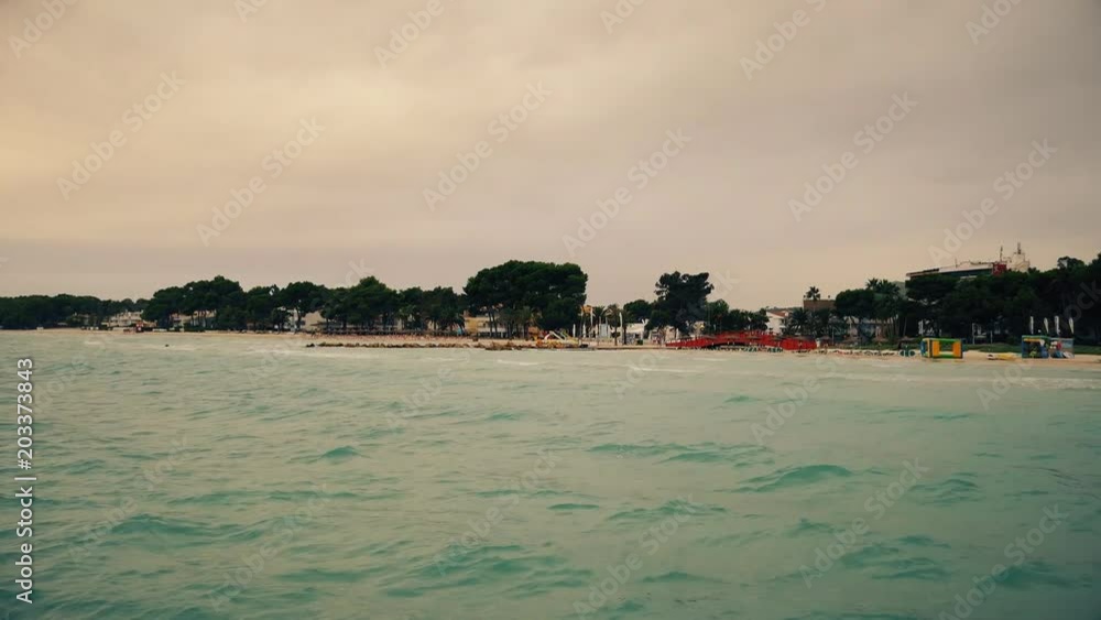 The sandy shore of the turquoise sea. The sandy shore of the turquoise sea.