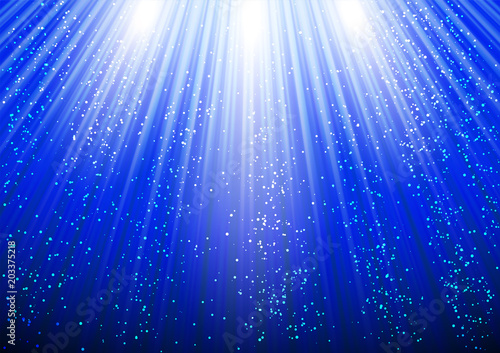 Background with glowing rays and shiny glitter