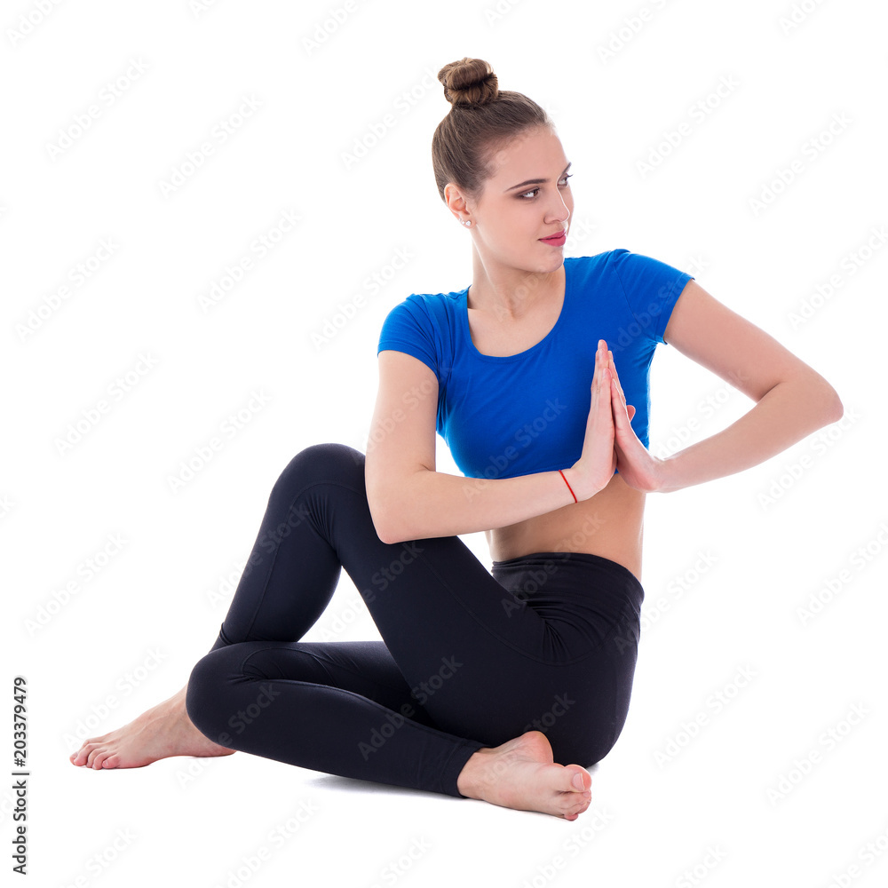 young beautiful woman in yoga pose isolated on white