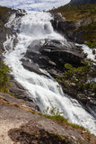Stunning waterfall falling from the rock in Hardangervidda national park, Norway
