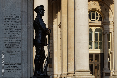 Statue and memorial in front of Royal Exchange photo