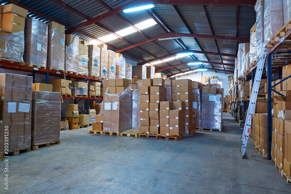 Warehouse stograge with stacked boxes in rows Warehouse stograge with stacked boxes in rows