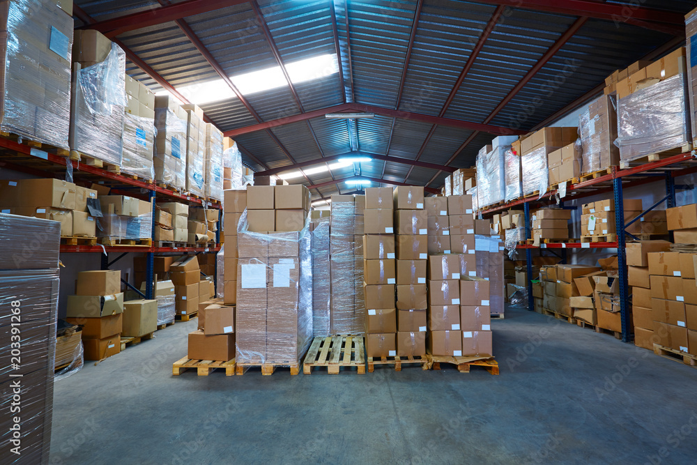 Warehouse stograge with stacked boxes in rows Warehouse stograge with stacked boxes in rows