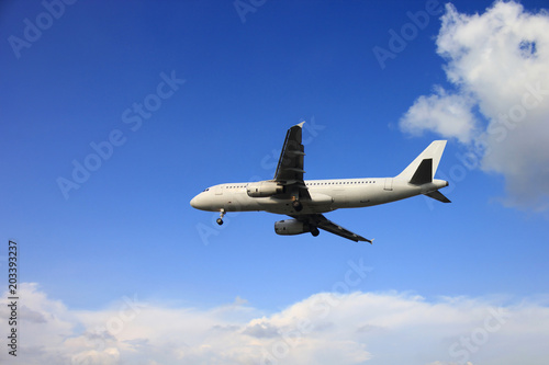 Airplane with beautiful sky on background