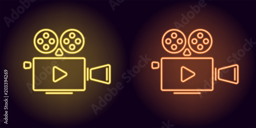 Neon cinema projector in yellow and orange color