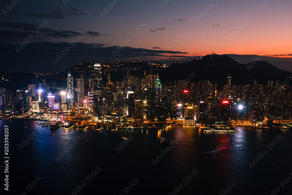 Aerial view on Illuminated Hong Kong island after sunset