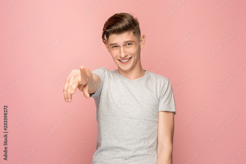 The happy business man point you and want you, half length closeup portrait on pink background. The happy business man point you and want you, half length closeup portrait on pink background.