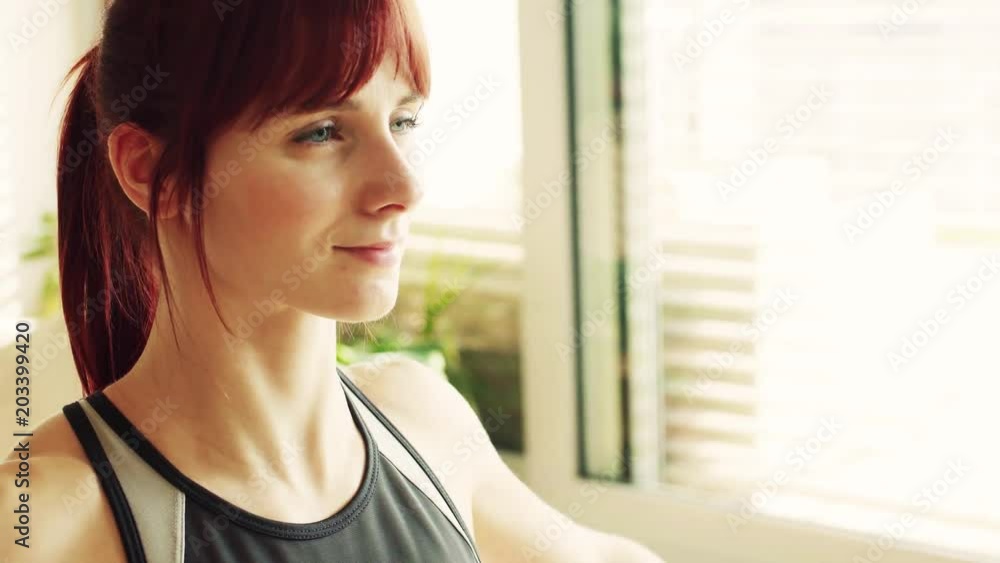 Young fitness woman doing exercise at home. Young fitness woman doing exercise at home.
