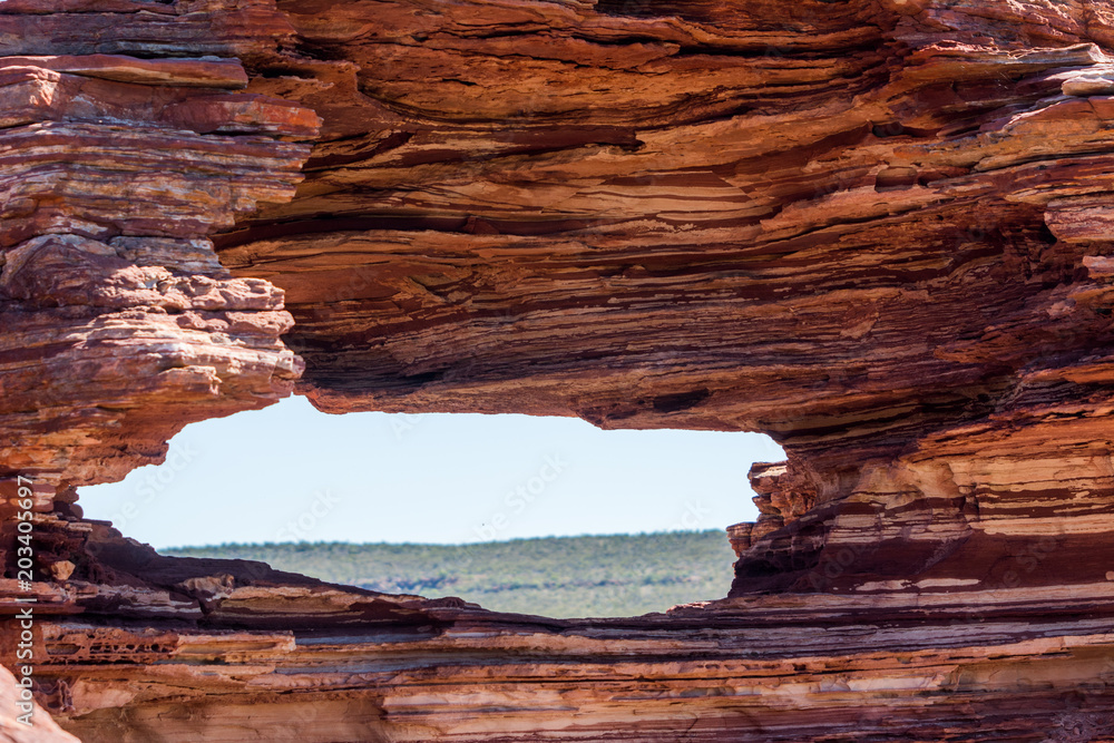 vores definitive Mary Scenic Panorama from lookout through nature window over gorge in Kalbarri  National Park, in outback Western Australia, Murchison River, rough rugged  rock formation, summer sunny blue sky, copy space. Stock Photo 