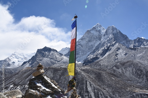 Praying flag and Mount Ama Dablam in the background, Nepal