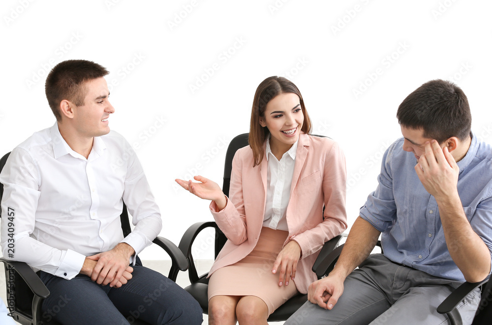 Group of young people sitting on chairs together, indoors. Unity concept Group of young people sitting on chairs together, indoors. Unity concept