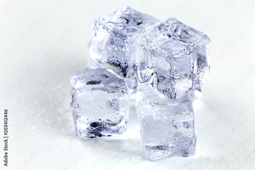 Ice cubes on white background. Ice cubes on white background.