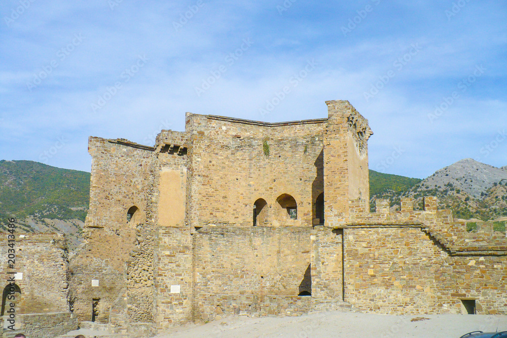 Ruins of the Sudak fortress, arch. Autumn.