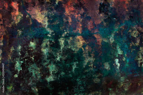 Abstract dark aged background in green  red and black colors. Grunge texture with stains.