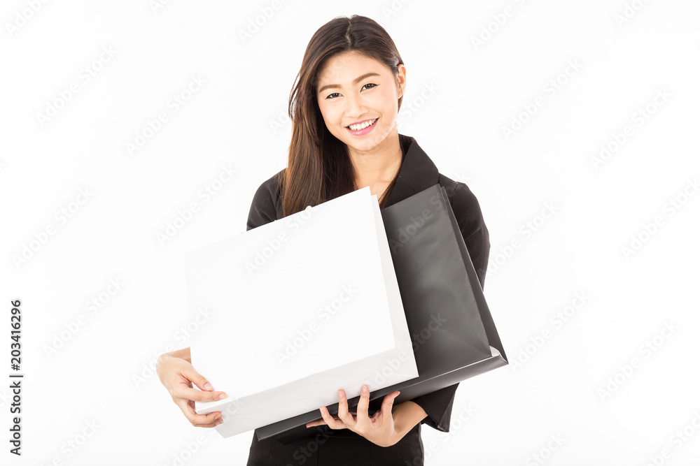 Beautiful Attractive Asian woman holding shopping bags smile and happiness,Isolated on white background,Shopping Concept Beautiful Attractive Asian woman holding shopping bags smile and happiness,Isolated on white background,Shopping Concept