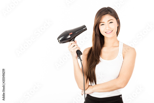 Beautiful Attractive Asian woman smile and holding hair dryer feeling so confident and happiness,Isolated on white background,Haircare Concept