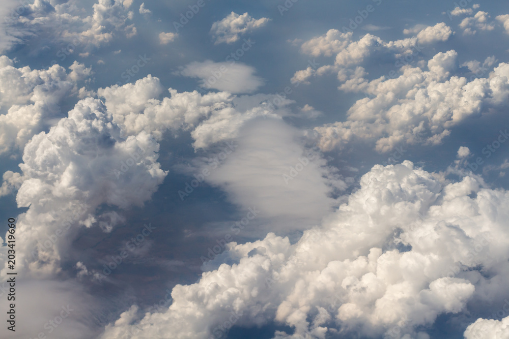 View above the clouds from air plane. View above the clouds from air plane.