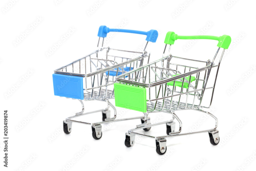 close up of mini shopping cart on white background