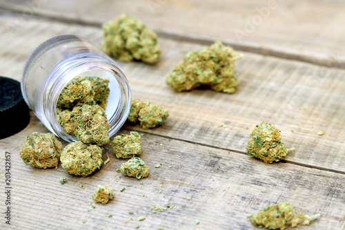 Marijuana Buds Spilling Out of Jar (Sativa Dominant Strain, Green Crack)