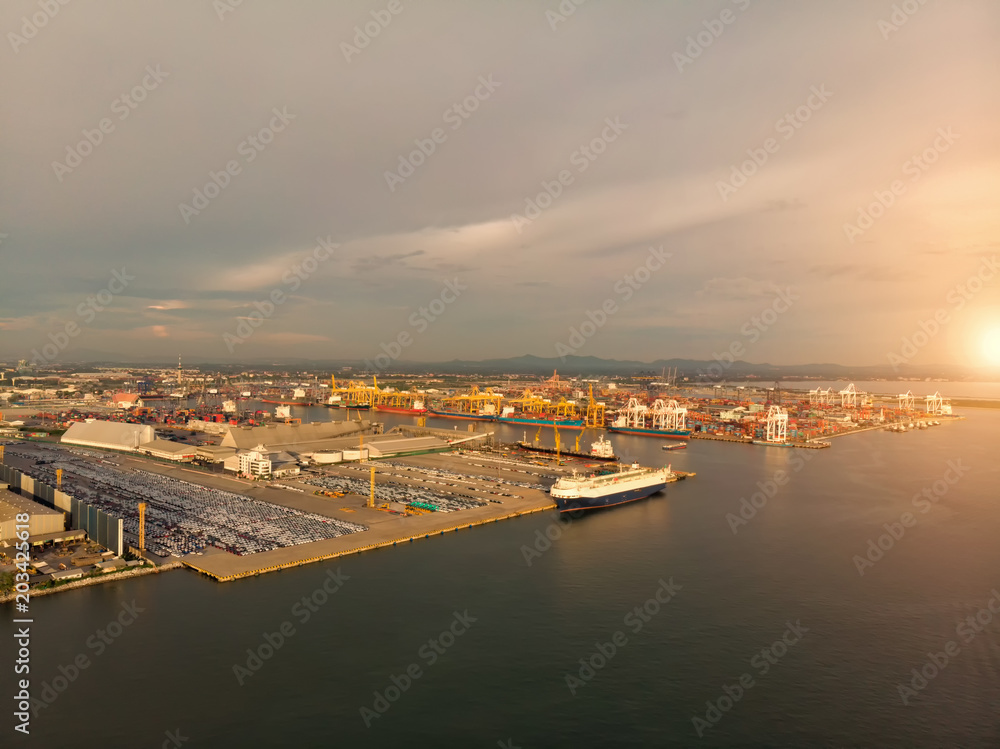 Aerial view a lot of car and ship port for import and export goods and container.