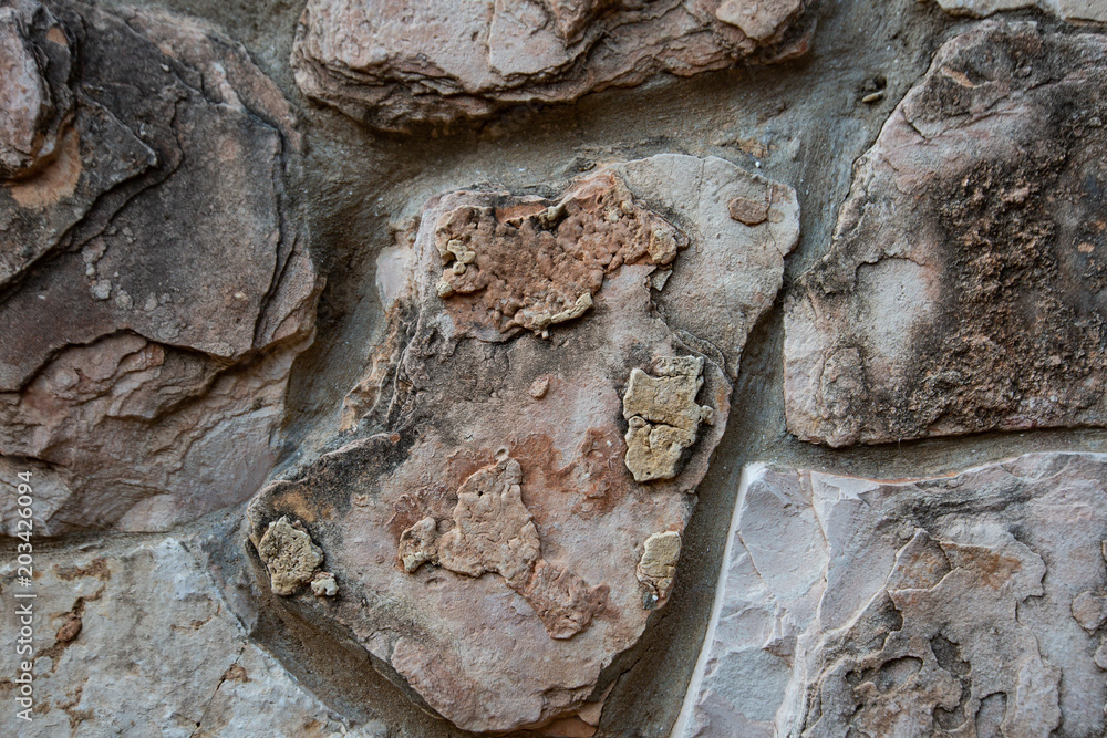 Close up of natural stone wall. Stone wall texture Close up of natural stone wall. Stone wall texture