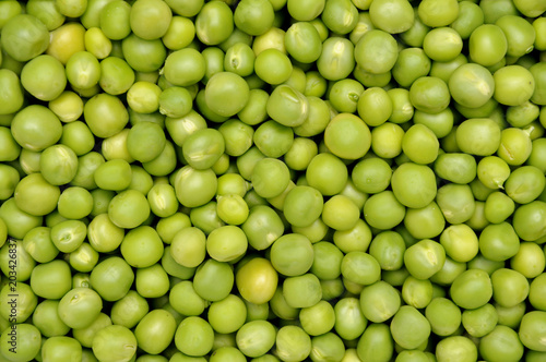 Close-up of green peas. Green Peas background. Fresh green peas close up. © Ofresia
