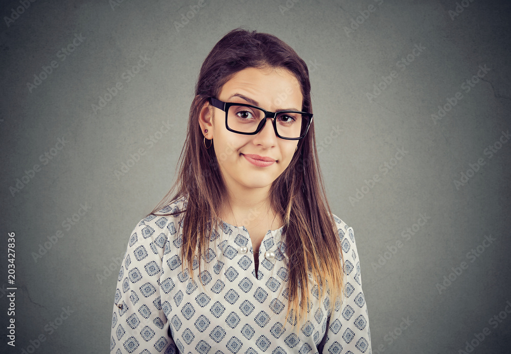Woman with doubtful face expression Woman with doubtful face expression