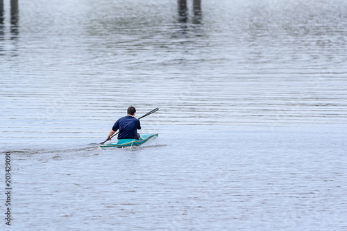 a man sails on a kayak