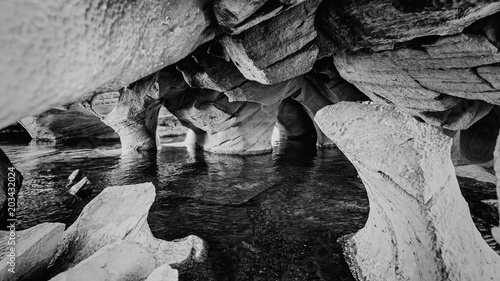 Black and White photography of very interesting formation of eroded rocks found on the Muckross Lake in Killarney National Park, Ireland photo