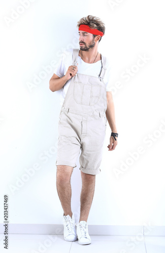 Full length of a young athlete on a white background