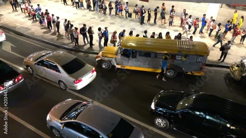 People waiting jeepny at the Makati city, Manila, Philippines