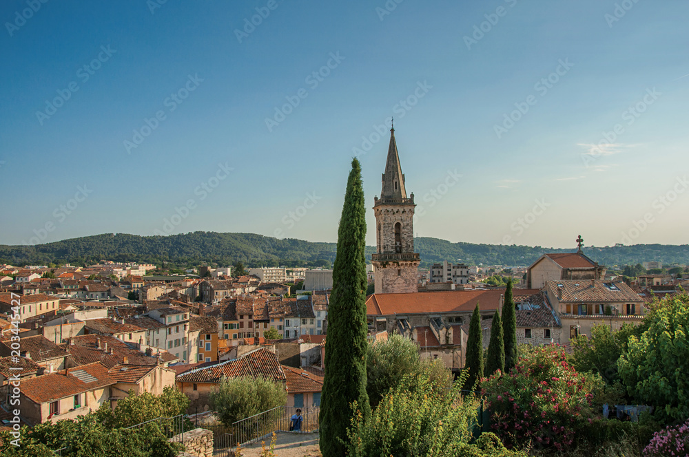 View of the lively and gracious town of Draguignan from the hill of the clock tower, under the colorful light of the sunset. Located in the Var department, Provence region, southeastern France