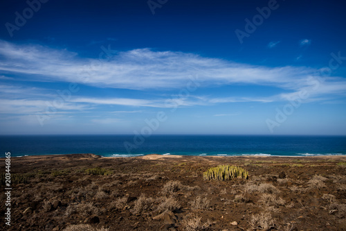 Blu sky  white clouds  atlantic ocean  lonely beach on Fuerteventura  Cofete
