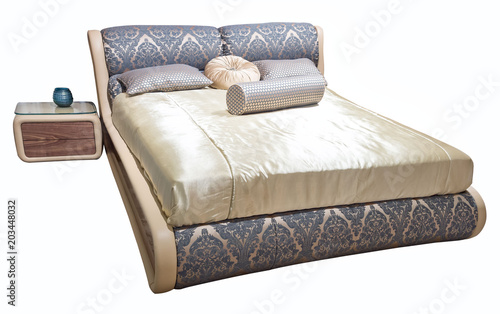 Luxury gray beige modern bed furniture with patterned bed with upholstery floral texture headboard. Soft velour fabric bedclothes. Classic modern furniture on isolated background