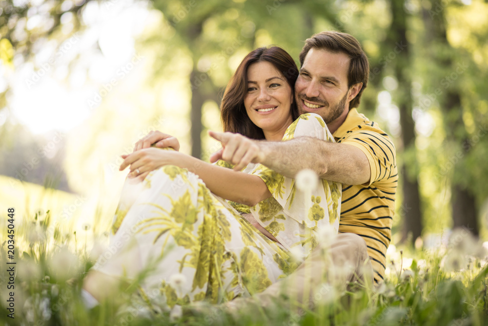 Portrait of middle age couple at nature. Spring season. Portrait of middle age couple at nature. Spring season.