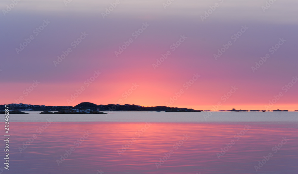 Setting sun glowing with beautiful colors,Saltholmen,Gothenburg,Sweden 