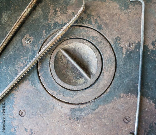 The surface of the iron stove with a round burner. photo