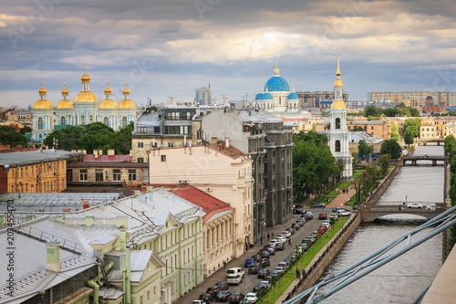 Top view of the center of St. Petersburg: river, cathedrals, old roofs