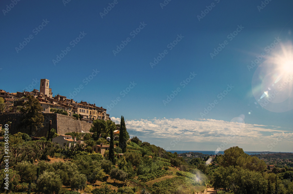 Panoramic view of the Saint-Paul-de-Vence village on top of hill, a lovely well preserved medieval hamlet near Nice. Alpes-Maritimes department, Provence region, southeastern France. Retouched photo