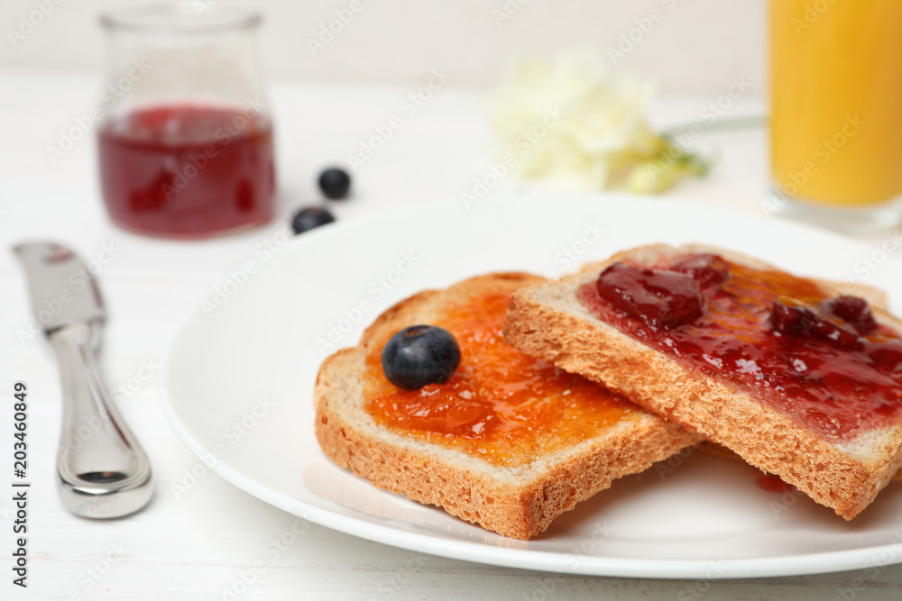 Toasts with jam on plate, closeup Toasts with jam on plate, closeup