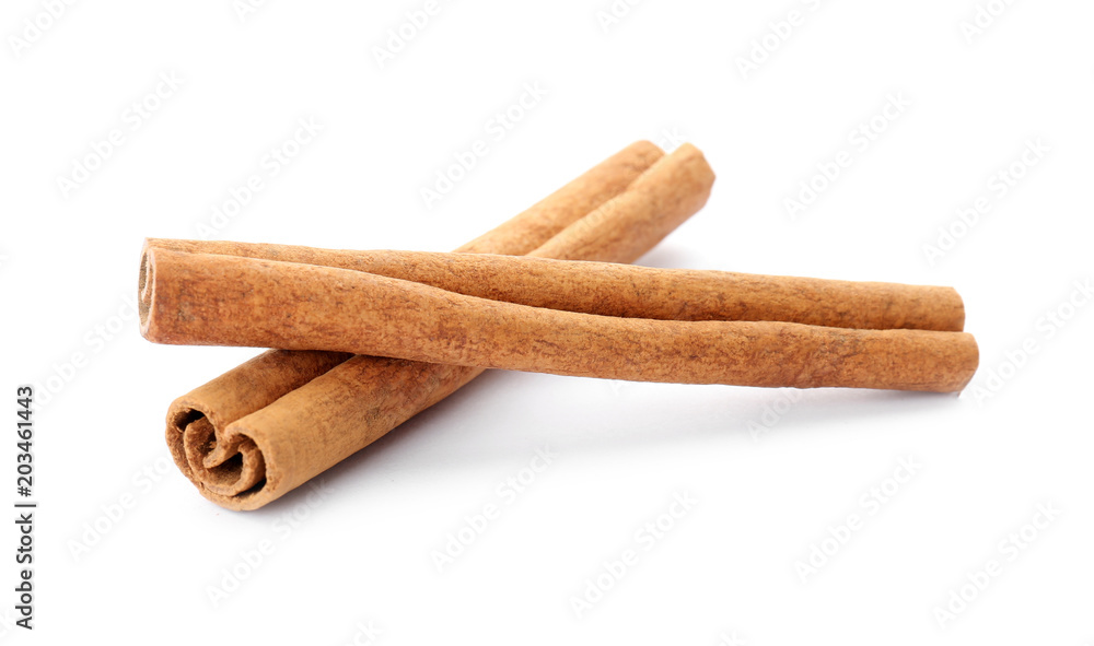 Aromatic cinnamon sticks on white background Aromatic cinnamon sticks on white background