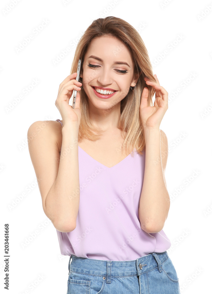 Young woman talking on phone against white background Young woman talking on phone against white background