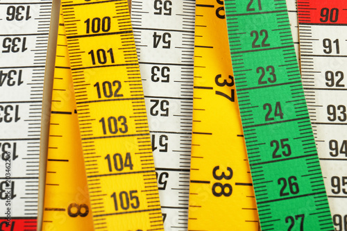 Different measuring tapes, closeup