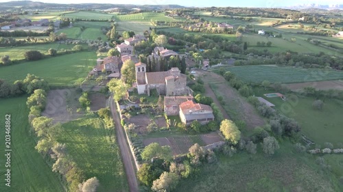 Drone en Cruilles y Monells monasterio Sant Miquel en el Ampurdan en Gerona, Costa Brava (Cataluña,España). Video aereo con Dron. photo