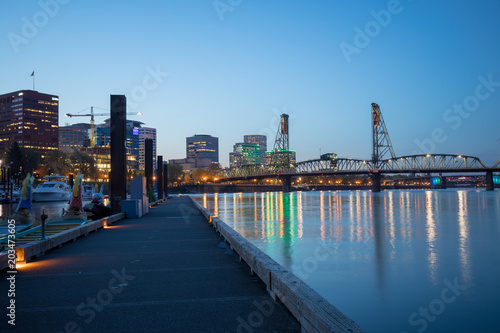 The Hawthorne Bridge on Willamette River at night in downtown Portland © yooranpark
