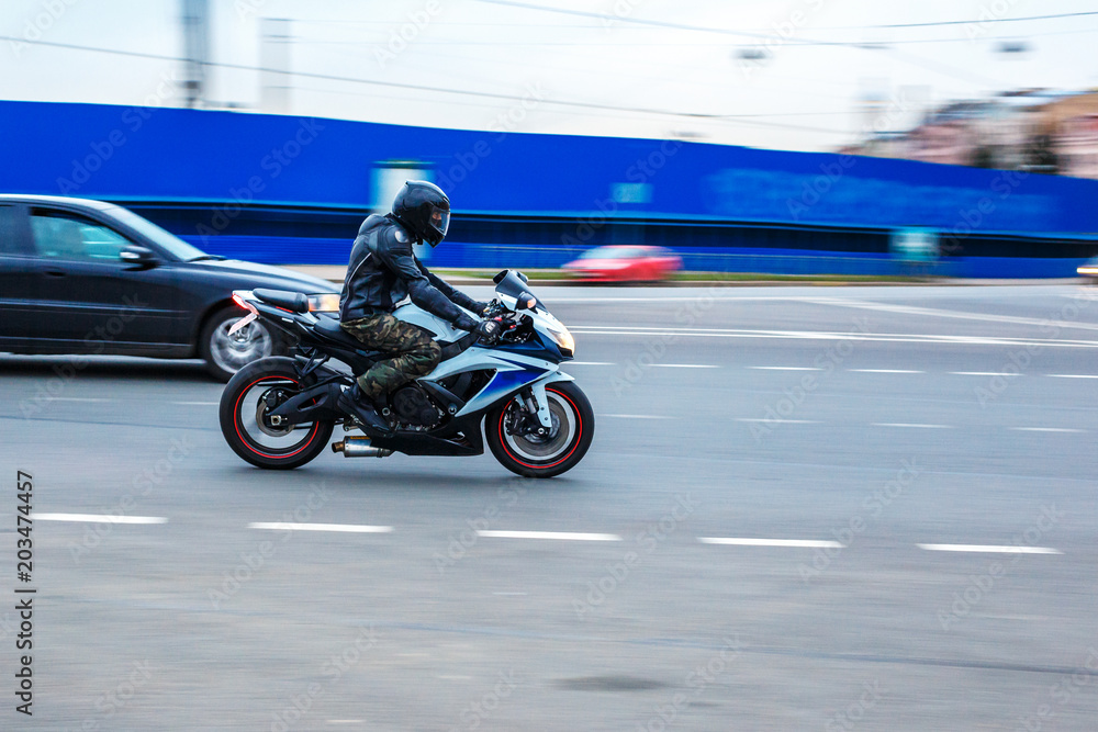 motorcycle on the road, driving on asphalt at speed